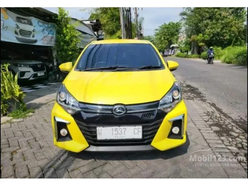 Jual Mobil Daihatsu Ayla 2022 R 1.2 di Jawa Timur Automatic Hatchback Kuning Rp 137.000.000