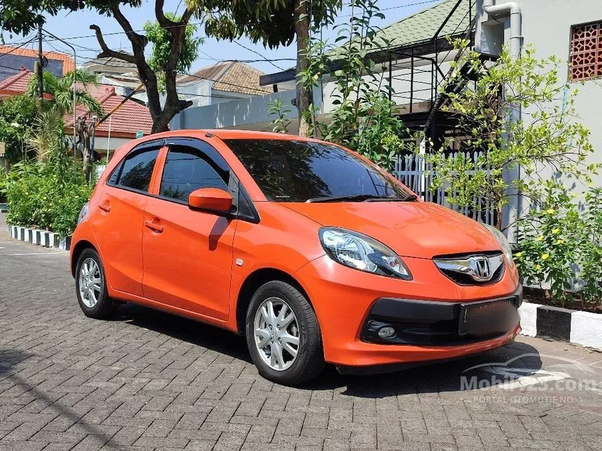 Jual Mobil Honda Brio 2014 Satya E 1.2 di Jawa Timur Manual Hatchback Orange Rp 112.000.006