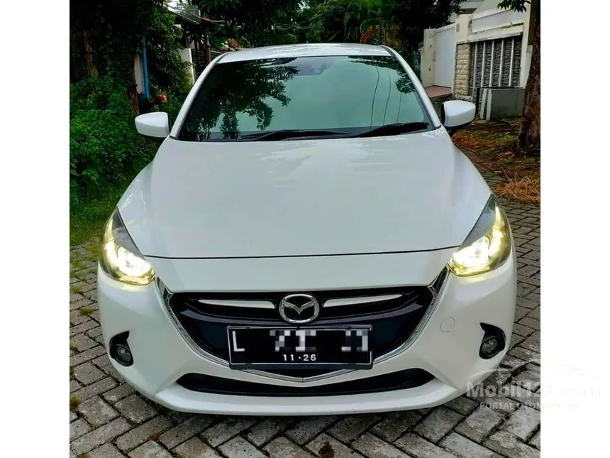 Jual Mobil Mazda 2 2015 GT 1.5 di Jawa Timur Automatic Hatchback Putih Rp 194.500.000