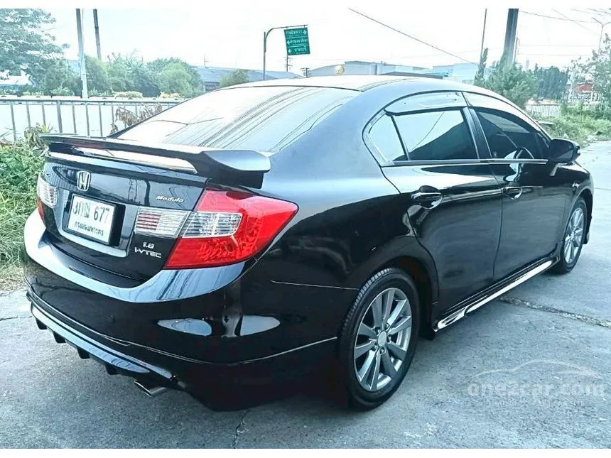 2014 Honda CIVIC E Modulo Sedan