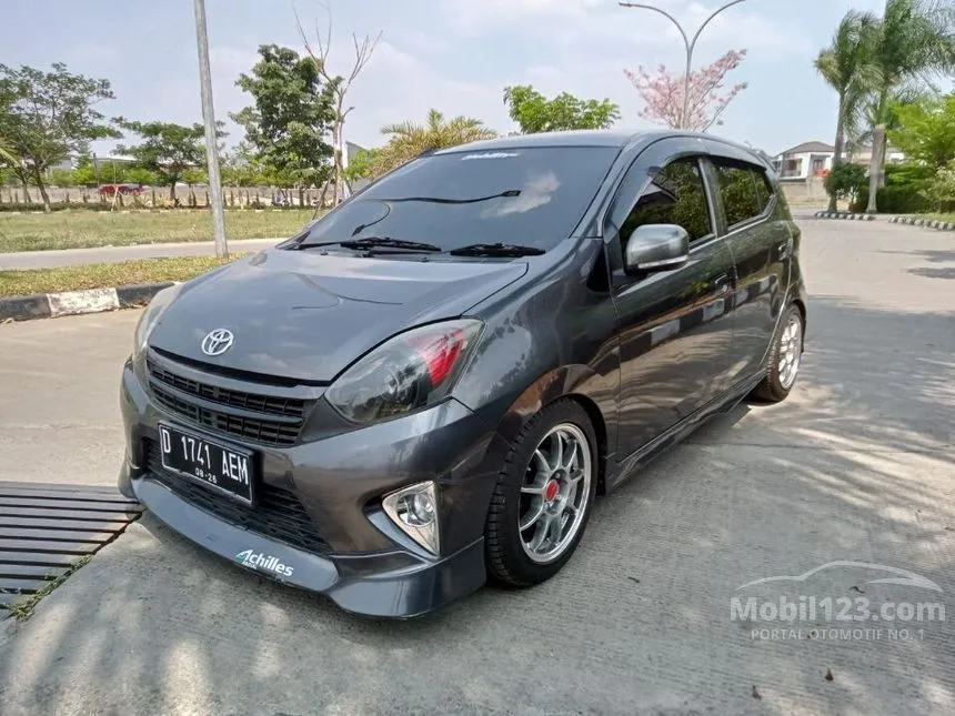Jual Mobil Toyota Agya 2016 E 1.0 di Jawa Barat Automatic Hatchback Abu