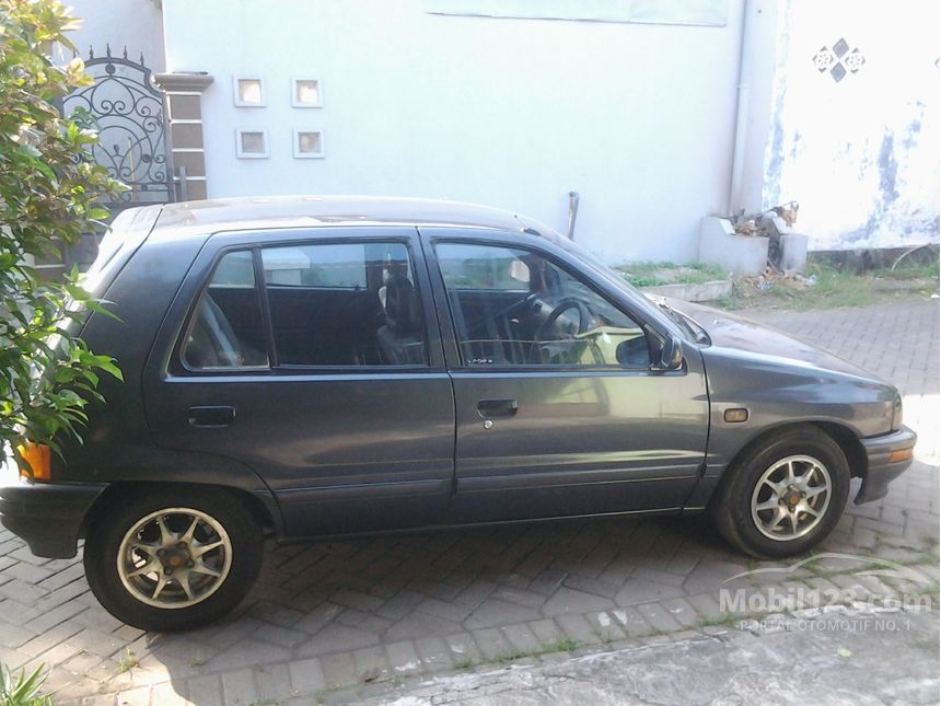 Jual Mobil Daihatsu Charade 1991 1.3 di Jawa Timur Manual Sedan Abuabu