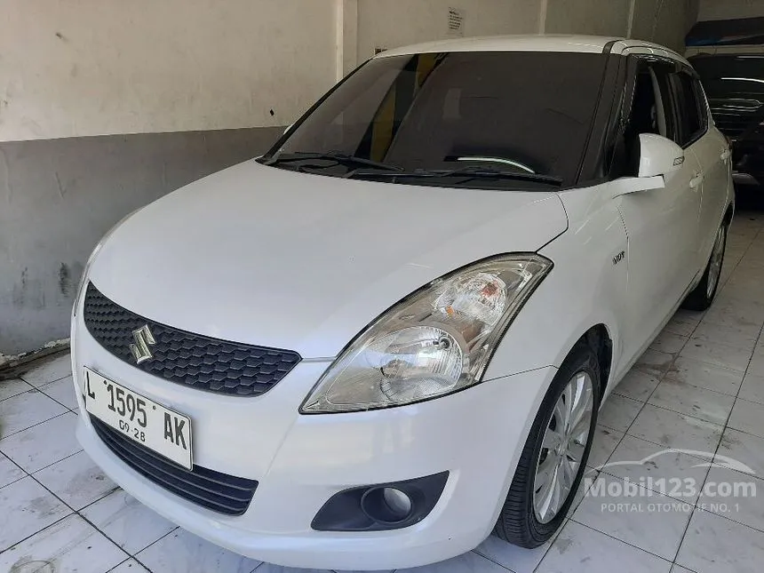 Jual Mobil Suzuki Swift 2013 GX 1.4 di Jawa Timur Manual Hatchback Putih Rp 135.000.000