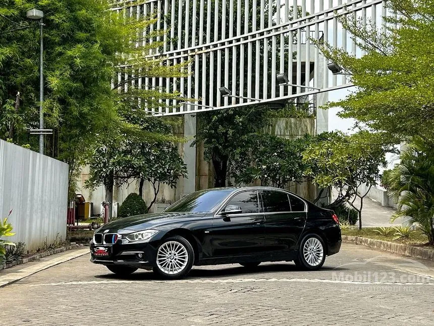 Jual Mobil BMW 320i 2013 Luxury 2.0 di DKI Jakarta Automatic Sedan Hitam Rp 248.000.000