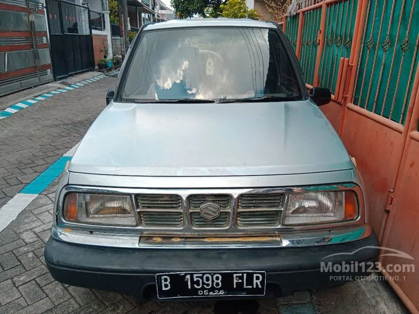 Jual Mobil Suzuki Sidekick 1997 1.6 di Jawa Timur Manual SUV Abu