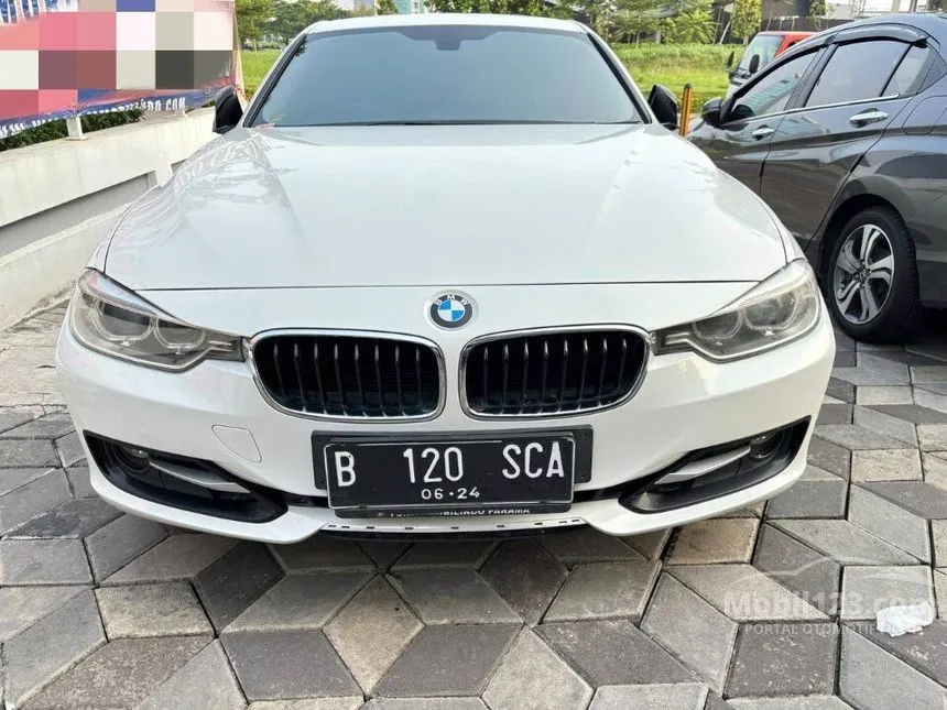 Jual Mobil BMW 320i 2014 Luxury 2.0 di Jawa Barat Automatic Sedan Putih Rp 269.000.000