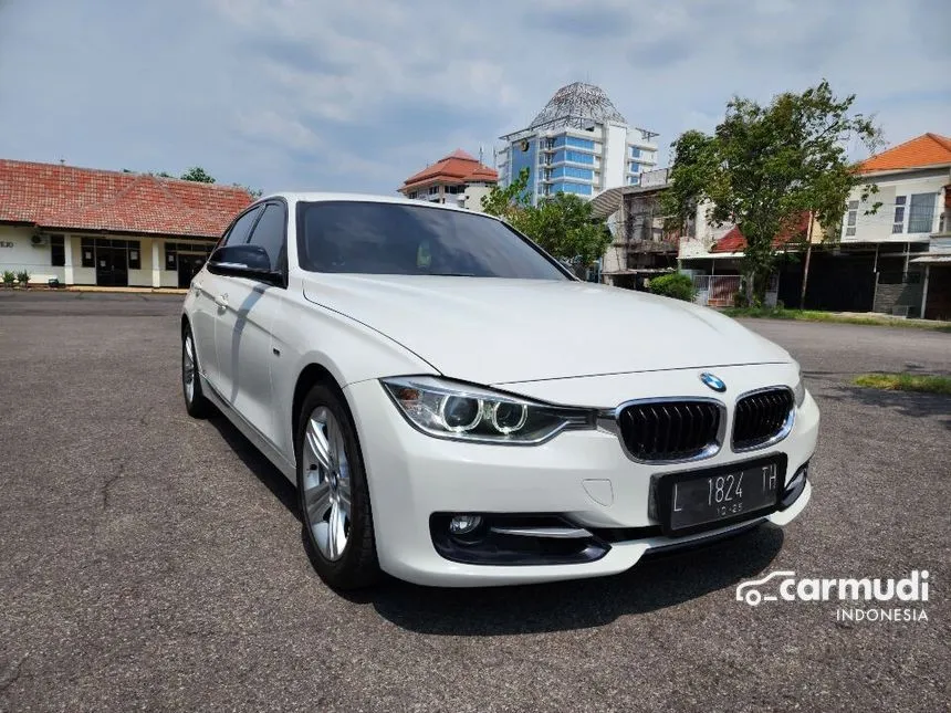 Jual Mobil BMW 320i 2013 Sport 2.0 di Jawa Timur Automatic Sedan Putih Rp 310.000.000