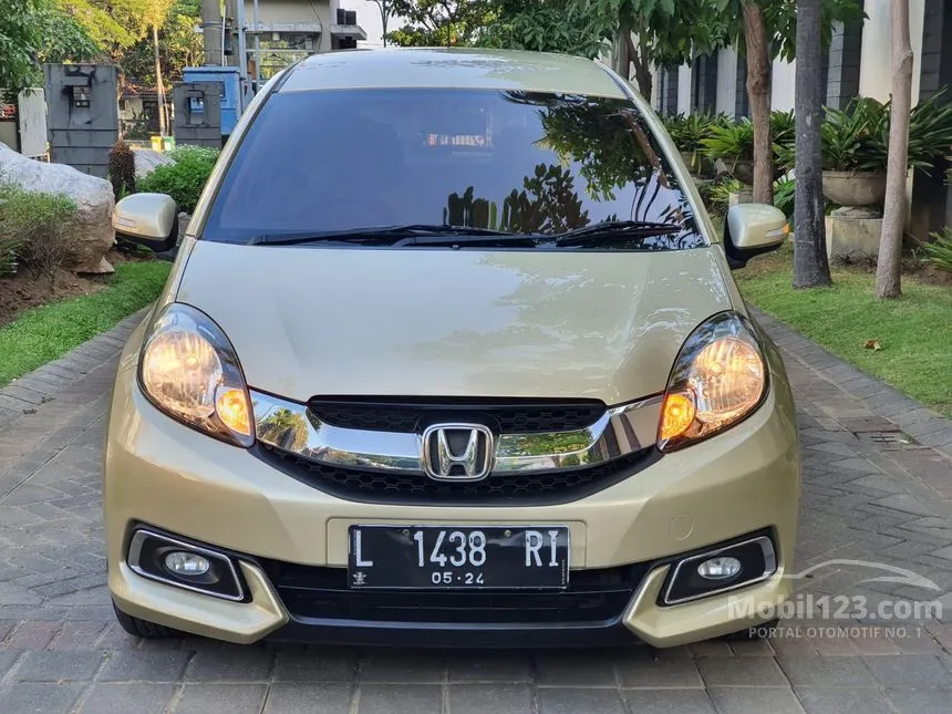 Jual Mobil Honda Mobilio 2014 E Prestige 1.5 di Jawa Timur Automatic MPV Emas Rp 130.000.000