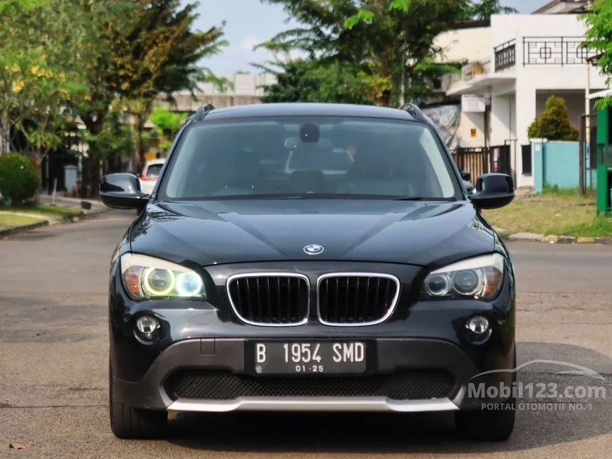 Jual Mobil BMW X1 2012 sDrive18i Executive 2.0 di Banten Automatic SUV Hitam Rp 175.000.000
