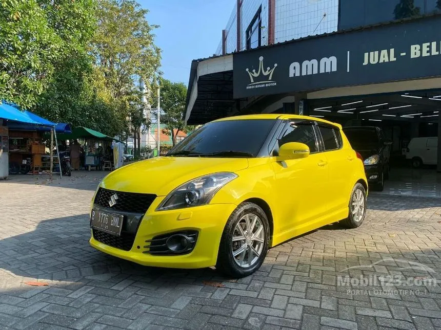 Jual Mobil Suzuki Swift 2014 SPORT 1.6 di Jawa Timur Automatic Hatchback Kuning Rp 239.000.000