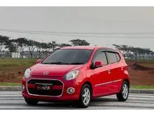 2015 Daihatsu Ayla 1.0 X Airbag Hatchback MT 2015 merah metalik KM low
