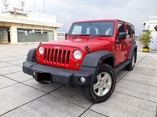 Jeep Wrangler Sport 3.6 Unlimited AT 2012 Merah Pakaian Pribadi