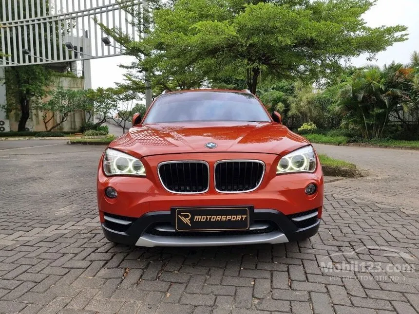 Jual Mobil BMW X1 2013 sDrive18i xLine 2.0 di DKI Jakarta Automatic SUV Orange Rp 185.000.000