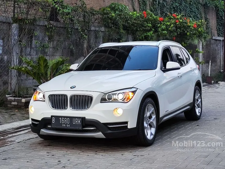 Jual Mobil BMW X1 2013 sDrive18i xLine 2.0 di Jawa Barat Automatic SUV Putih Rp 245.000.000