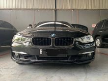2018 BMW 320i 2.0 Sport Sedan2018 BMW 320i 2.0 Luxury Sedan Black on Brown Service Record Warranty 2022 Low KM M Perf Ducktail & Grill