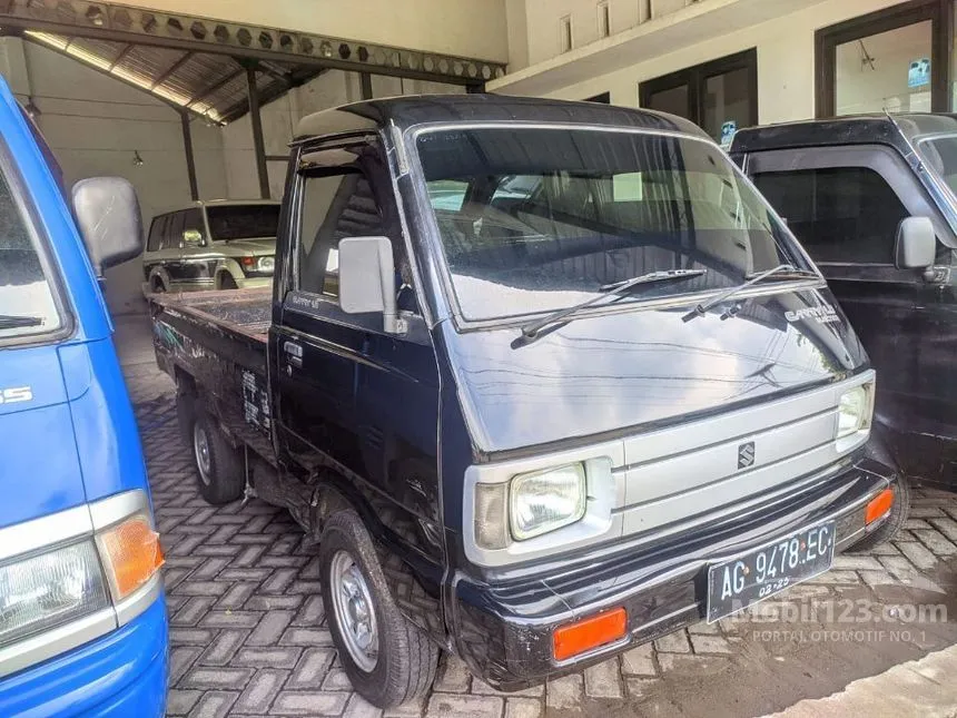 Jual Mobil Suzuki Carry 2009 Extra Pick Up 1.0 di Jawa Timur Manual Lorry Hitam Rp 63.500.000